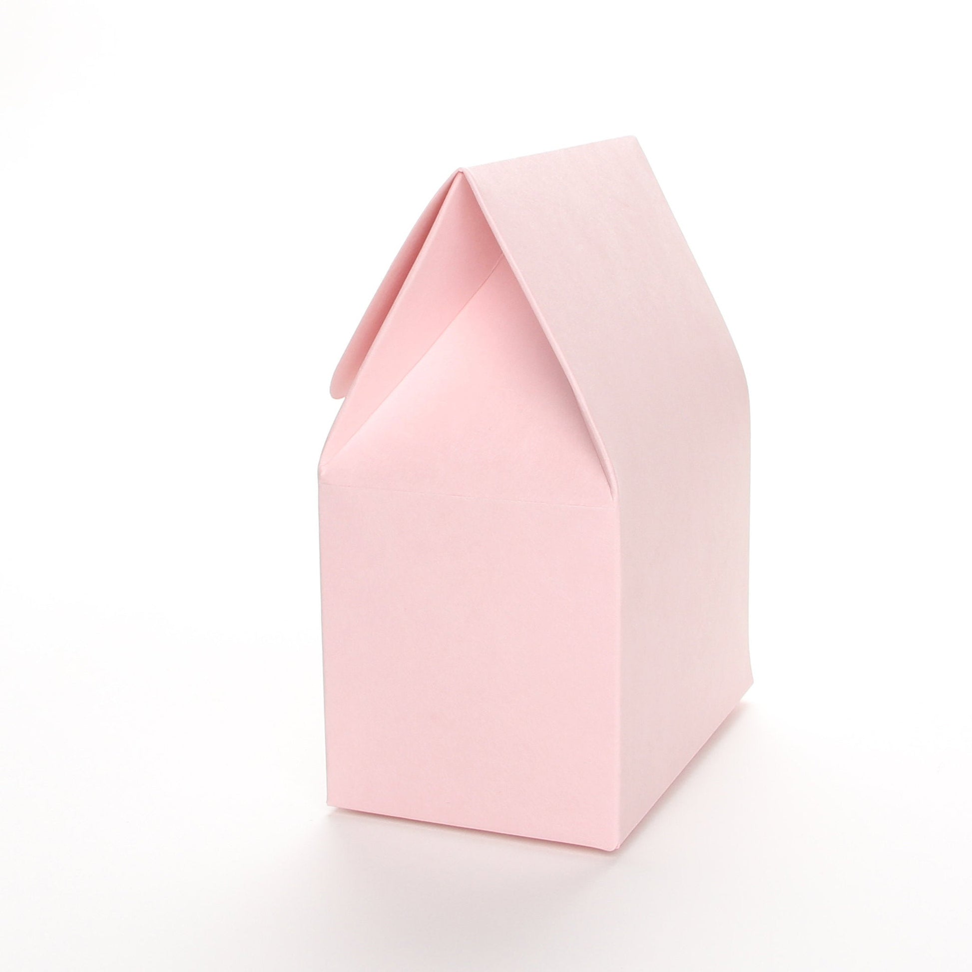 Side view of a pink favor box by Lux Party on a white background.