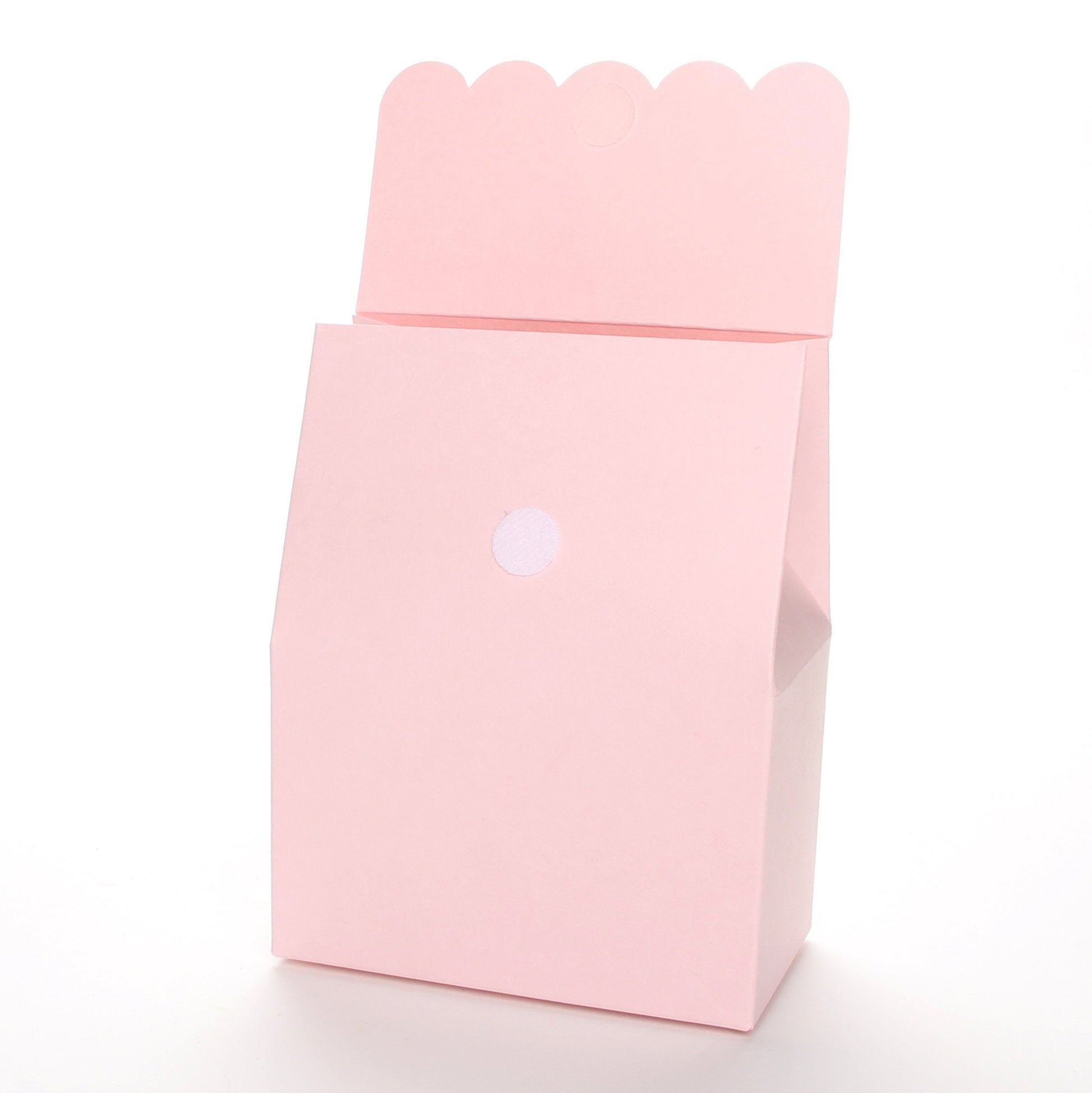 Lux Party’s pink favor box with scalloped lid open, showing a velcro closure.