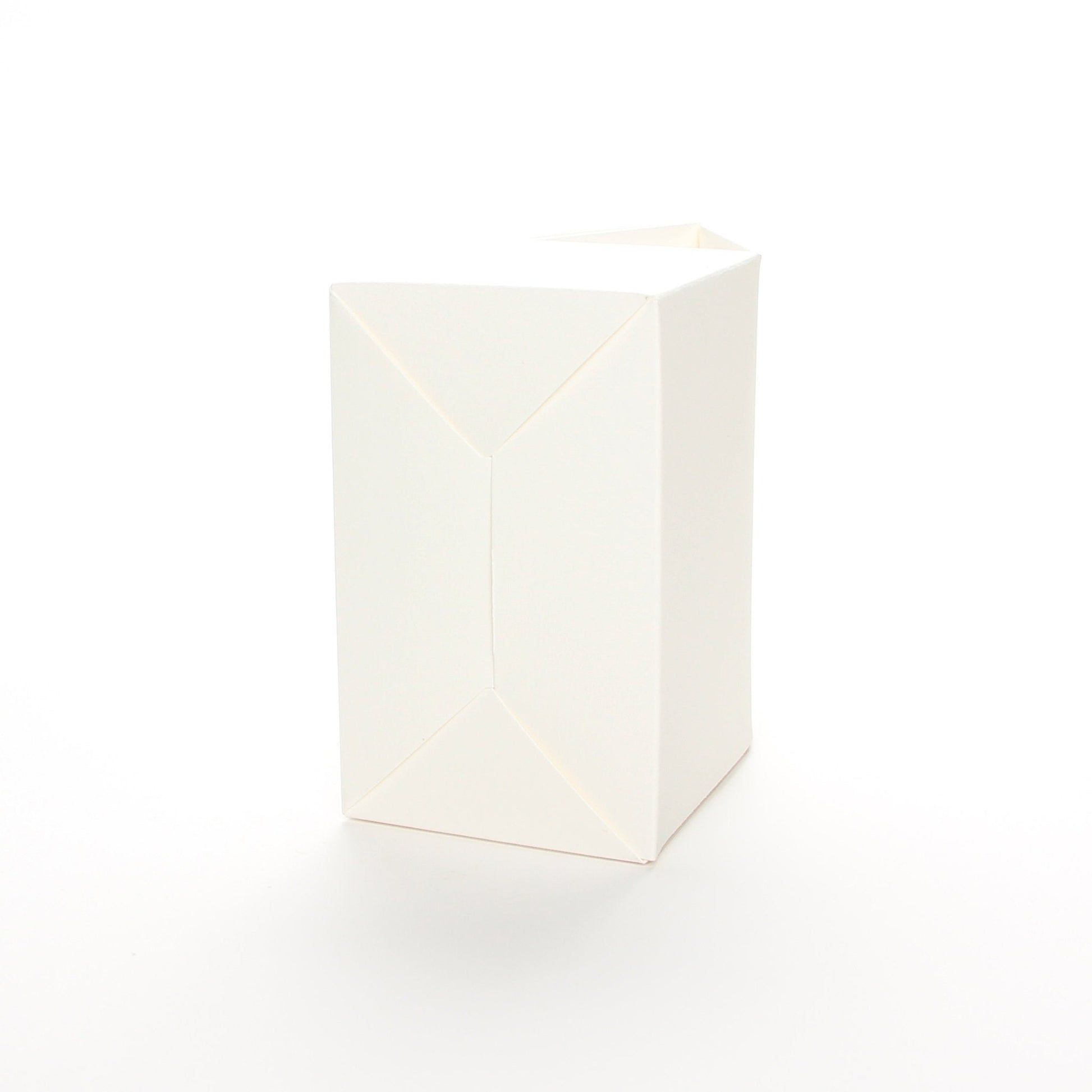 Bottom view of Lux Party’s ivory favor box on a white background.