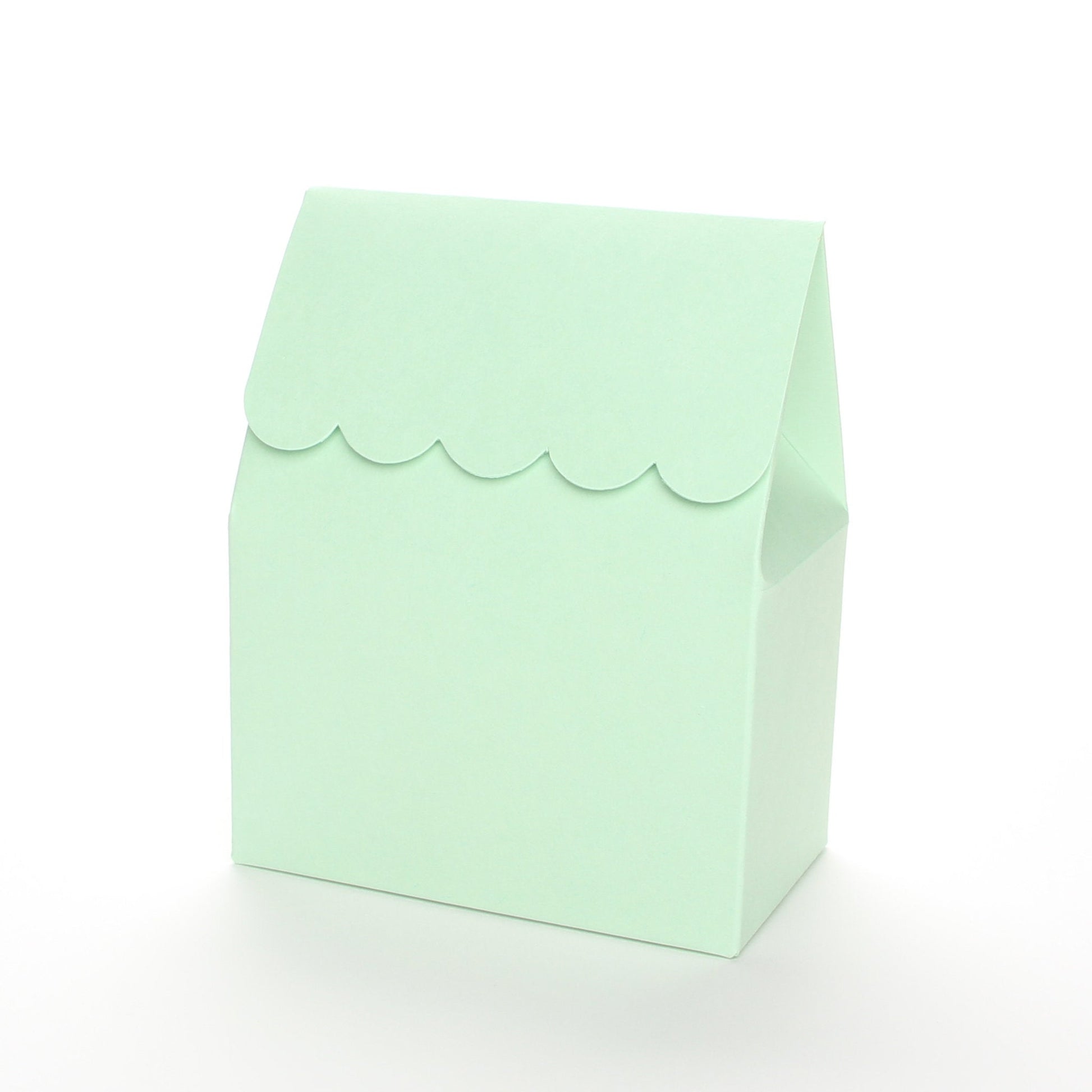 Mint green favor box by Lux Party with a scalloped edge on a white background.