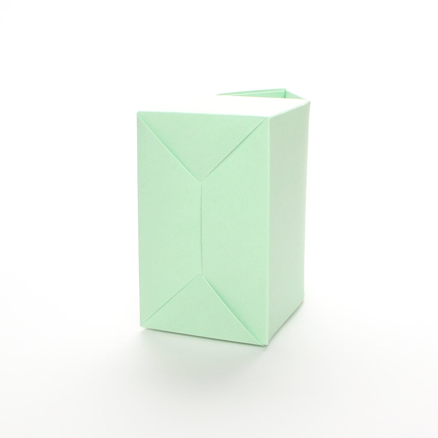 Bottom view of Lux Party’s mint green favor box on a white background.