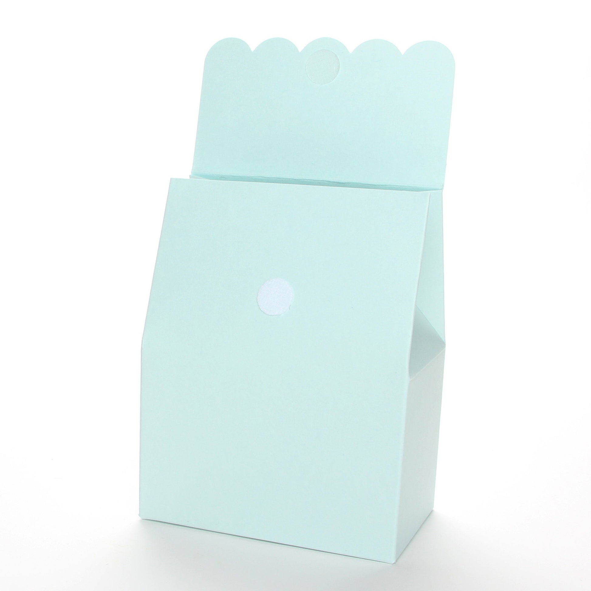 Lux Party’s light blue favor box with scalloped lid open, showing a velcro closure.