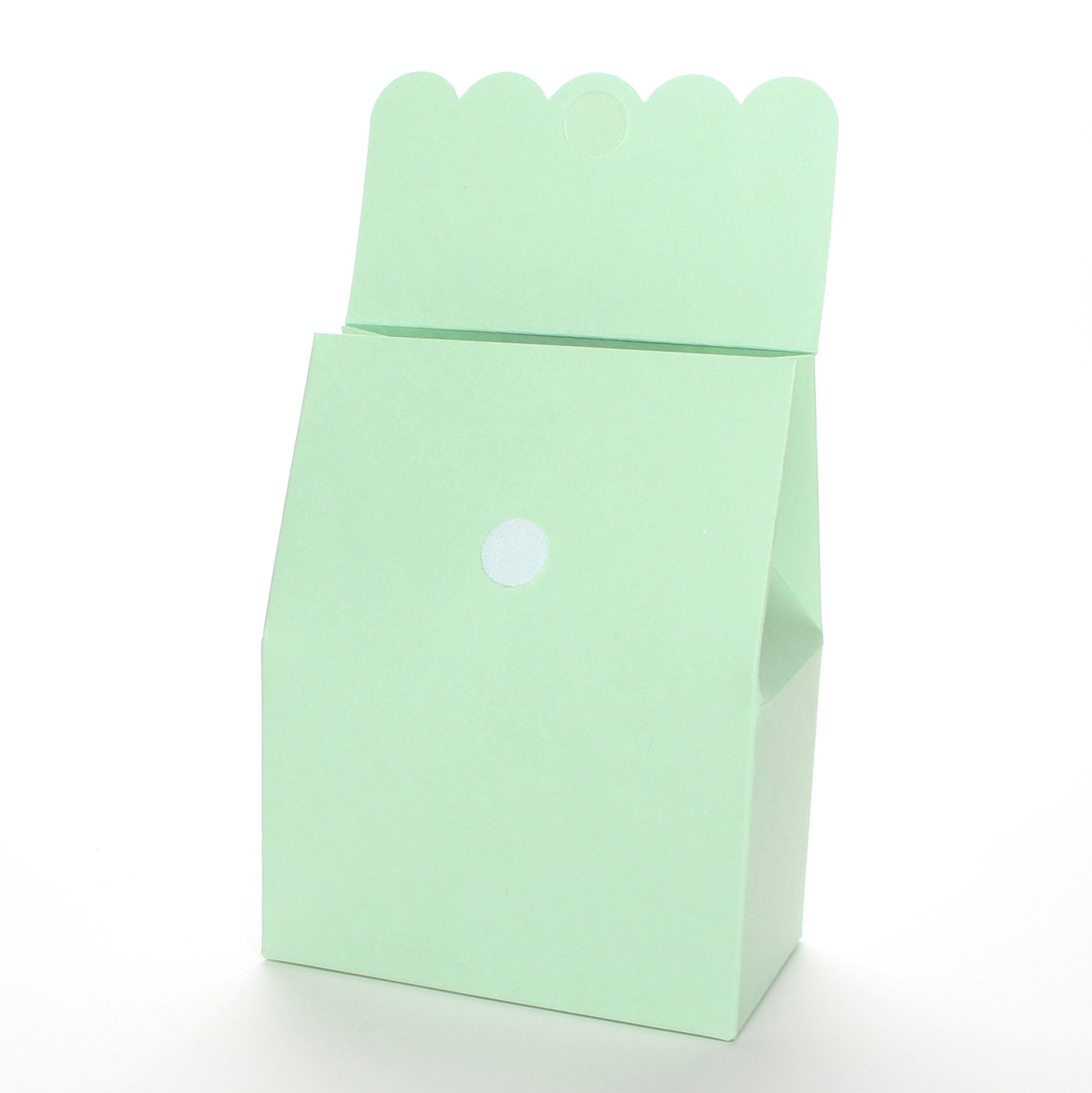Lux Party’s mint green favor box with scalloped lid open, showing a velcro closure.
