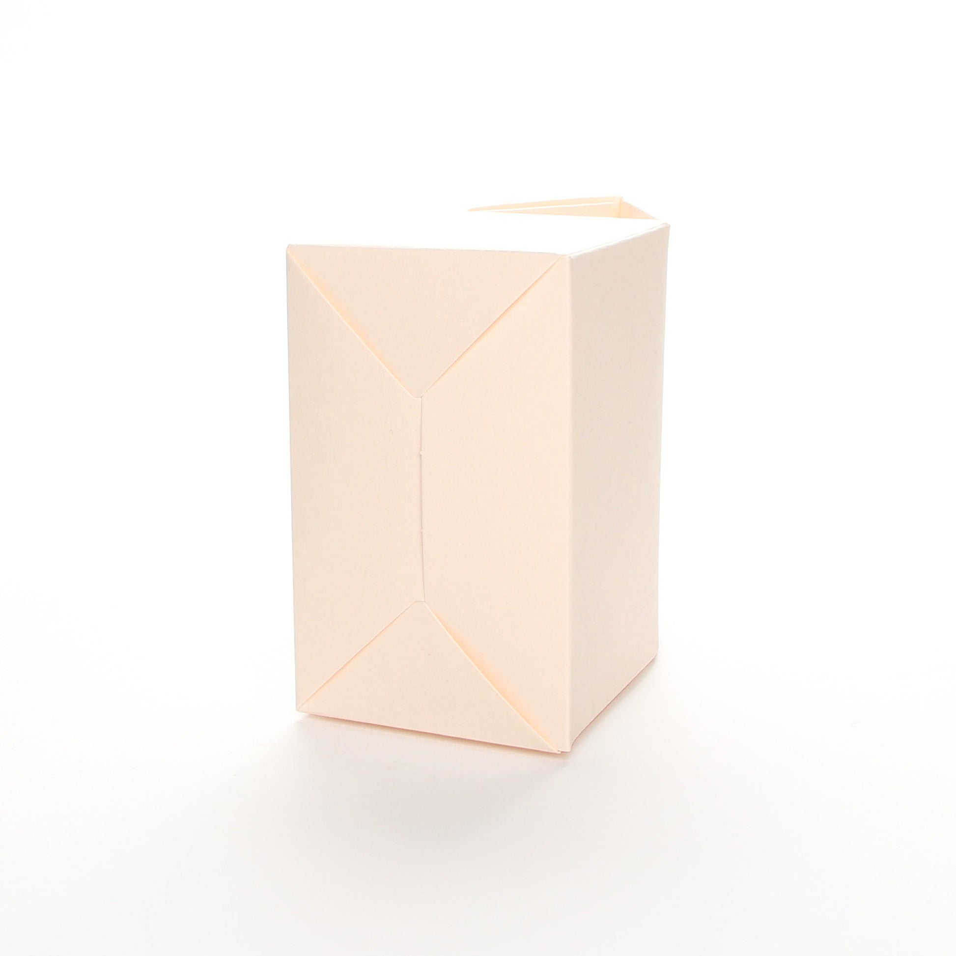 Bottom view of Lux Party’s pink favor box on a white background.