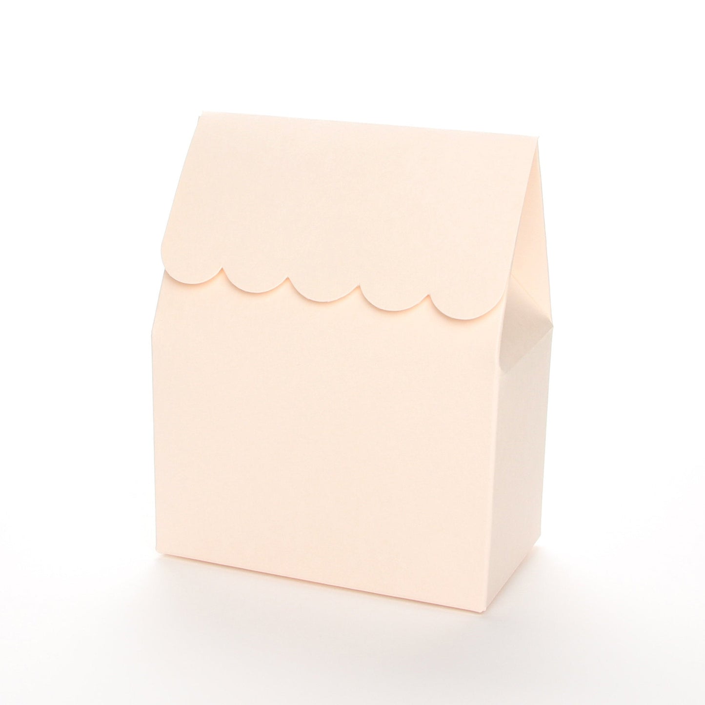 Blush favor box by Lux Party with a scalloped edge on a white background.