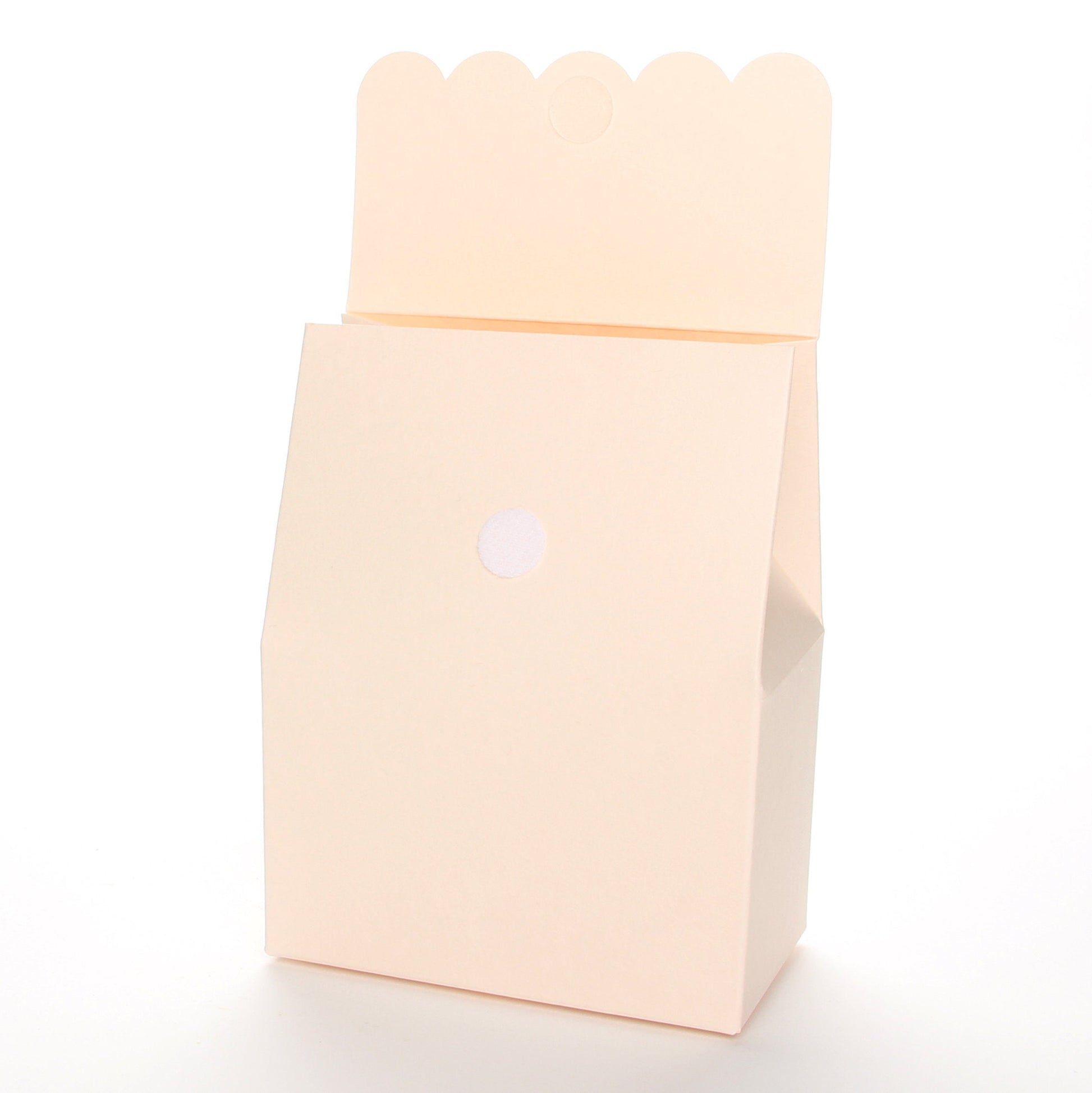 Lux Party’s blush favor box with scalloped lid open, showing a velcro closure.
