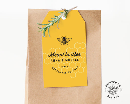 Lux Party’s yellow meant to bee wedding favor tag with black lettering, affixed to a brown kraft favor bag.