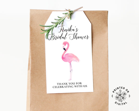 Lux Party’s white flamingo bridal shower favor tag with black lettering, affixed to a brown kraft favor bag.