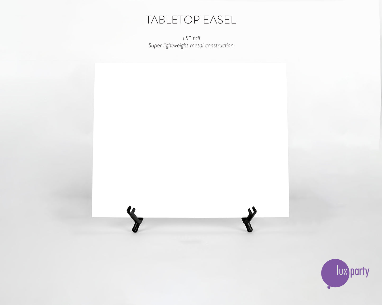 Black lightweight metal tabletop easel, holding a blank white sign, against a white background. Lux Party logo.